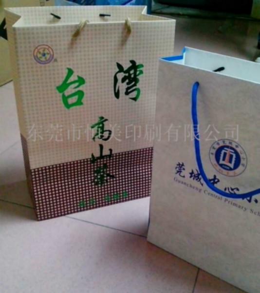 供应手提袋 纸袋 常用白卡纸礼品彩色手提袋定制印刷 服装袋 礼品袋