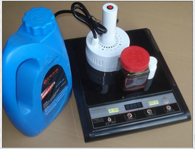供应小型机油壶润滑油防冻液瓶口封膜机