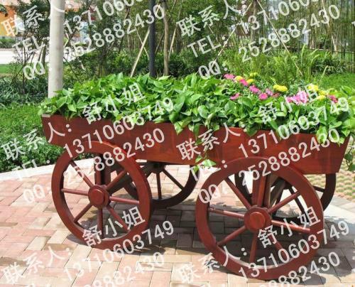 供应碳化木花车,黑龙江广场售货车图片