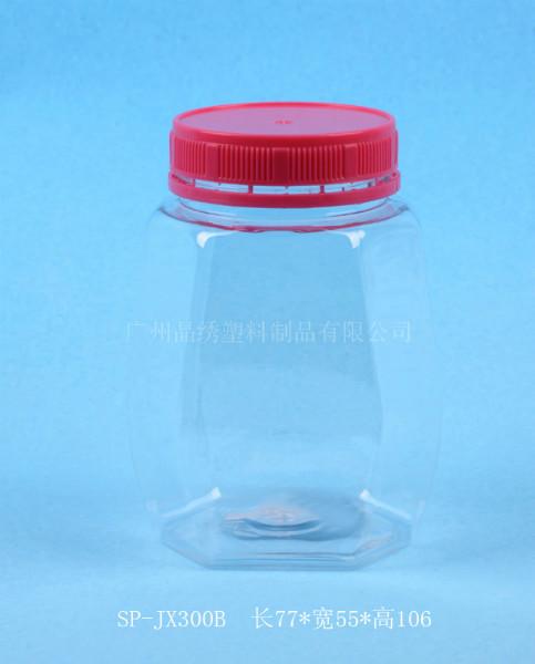 供应广州防盗盖塑料瓶休闲食品手提瓶果脯饯罐新款PET透明瓶